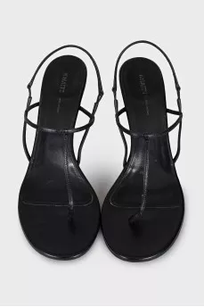 Black sandals with a figured heel