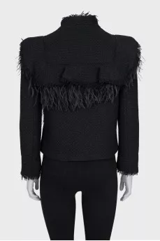 Jacket with buttons decorated with feathers