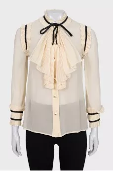 Sheer blouse with ruffles