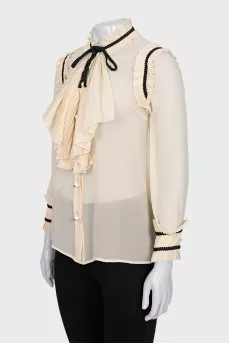 Sheer blouse with ruffles
