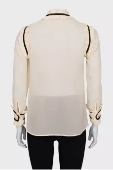 Sheer blouse with ruffles
