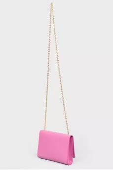 Clutch with a bow on a magnet