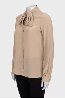 Silk blouse with a bow
