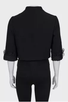 Cropped jacket with a bow