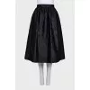 Black skirt with a relief pattern