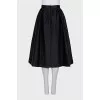 Black skirt with a relief pattern