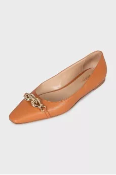 Brown ballet flats with a curved toe