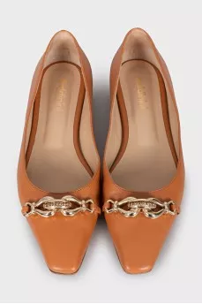 Brown ballet flats with a curved toe