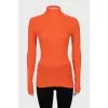 Orange turtleneck with a cutout back