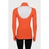 Orange turtleneck with a cutout back