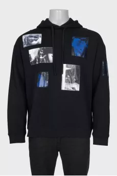 Men's hoodie decorated with patches