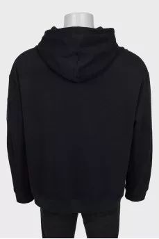 Men's hoodie decorated with patches