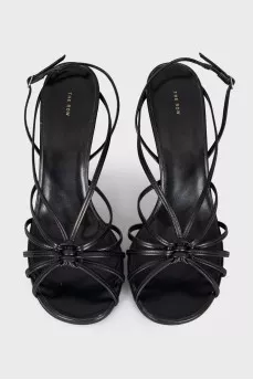 Black leather sandals with braided pattern