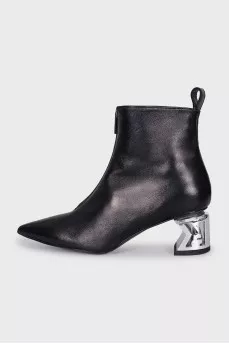 Black ankle boots with silver heels