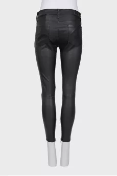 Leather trousers with distressed knees