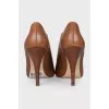 Leather ankle boots with a front zip