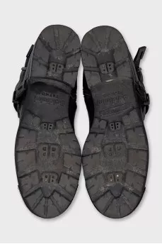 Leather boots with metal overlay