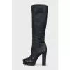 Leather boots with a relief pattern
