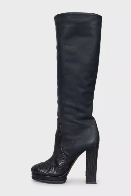 Leather boots with a relief pattern