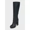 Leather boots with a relief pattern