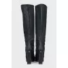 Leather boots with a relief pattern