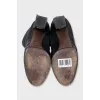 Leather boots with a relief pattern
