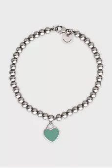 Silver bracelet with a heart pendant