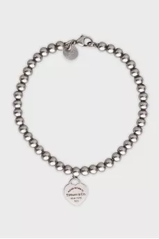 Silver bracelet with a heart pendant