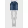 Denim skirt decorated with lace