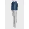 Denim skirt decorated with lace