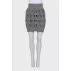 Wool skirt with shaped cutouts