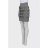 Wool skirt with shaped cutouts