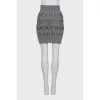 Wool skirt with shaped cutouts