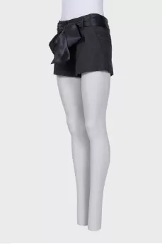 Short shorts with a silk belt