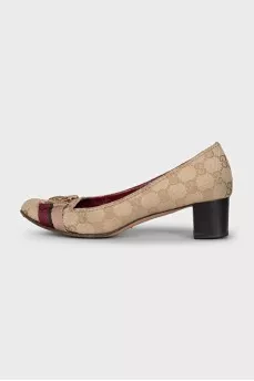 Textile shoes with a signature monogram