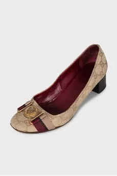 Textile shoes with a signature monogram