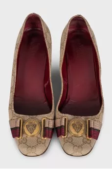 Textile shoes with a signature monogram
