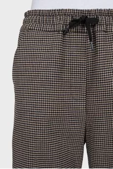 Wide-leg trousers in houndstooth print