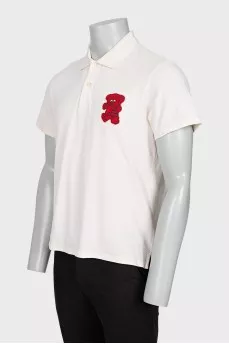 Men's polo shirt with a patch