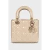 Лакированная сумка из кожи Lady Dior