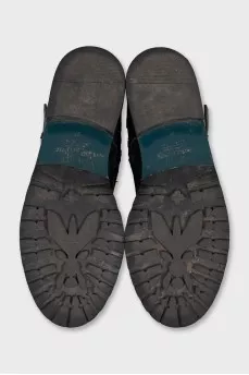 Leather boots with a zipper and laces