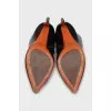 Black pointed-toe boots