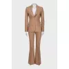 Beige suit with flared trousers