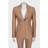 Beige suit with flared trousers