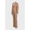 Beige suit with flared trousers