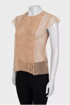 Sheer top decorated with frills