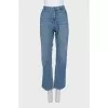Blue straight jeans with a button