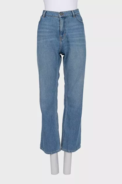 Blue straight jeans with a button