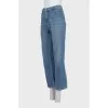 Blue straight jeans with a button