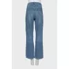 Blue straight jeans with a button